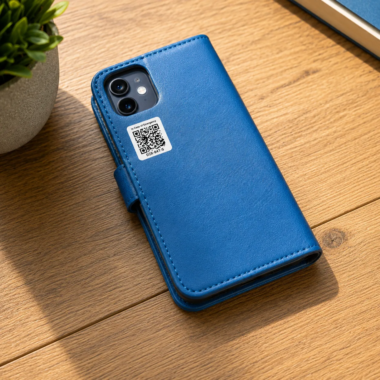 ICE Jar QR code sticker on the back of a phone case